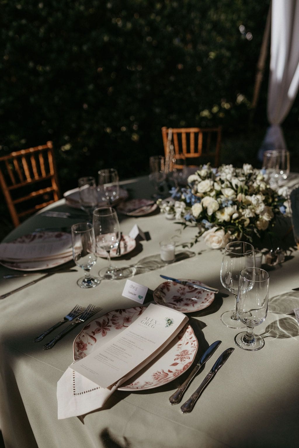 Table setting at wedding reception with lush florals and attention to detail, designed by ETC. Coordinators wedding planning, 6-Week-Out Wedding Coordinator